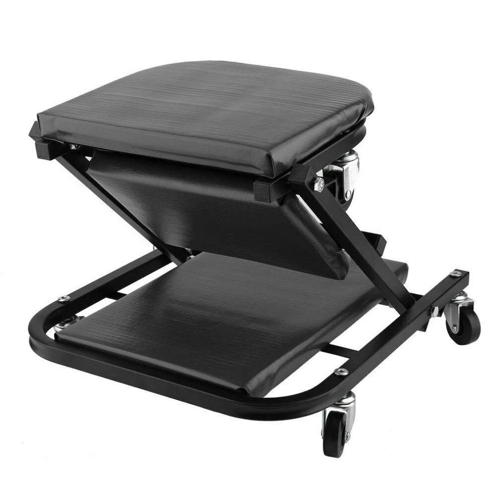 Vista lateral de camilla mecánico silla plegable acolchada con ruedas en color negro