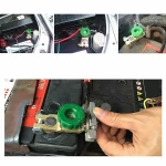 Vista frontal del desconectador de batería para camión y barco con perilla verde
